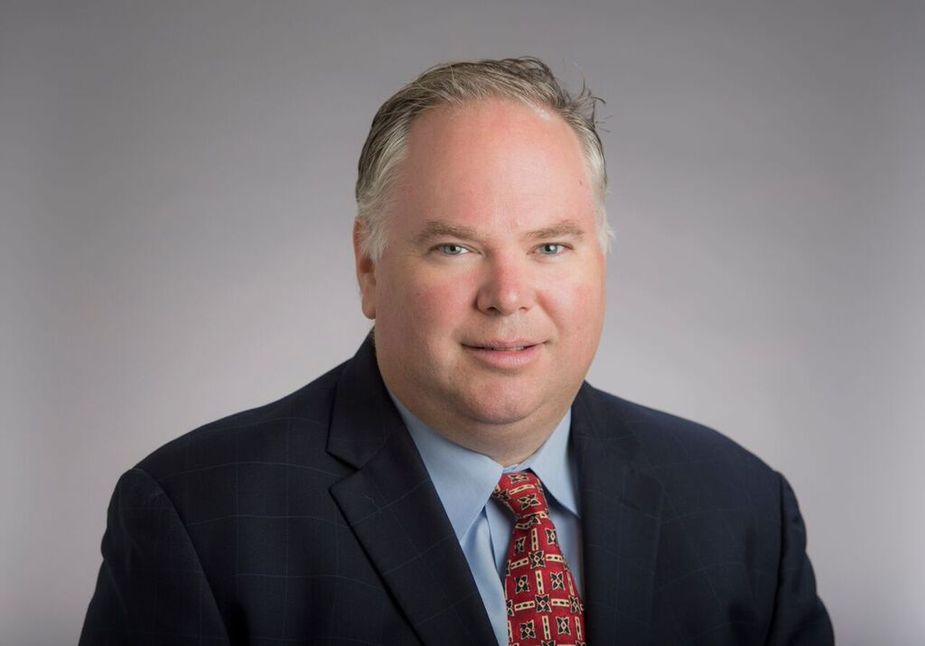Barry Biffle of the Kansas City Fed's Denver Branch Board of Directors sitting for a photo.