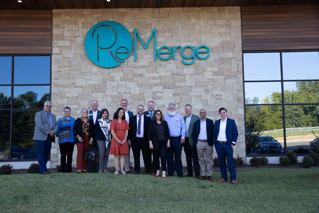 Members of the Kansas City Fed Community Development Advisory Council and staff members gather outside the offices of ReMerge, a nonprofit in Oklahoma City, Oklahoma.