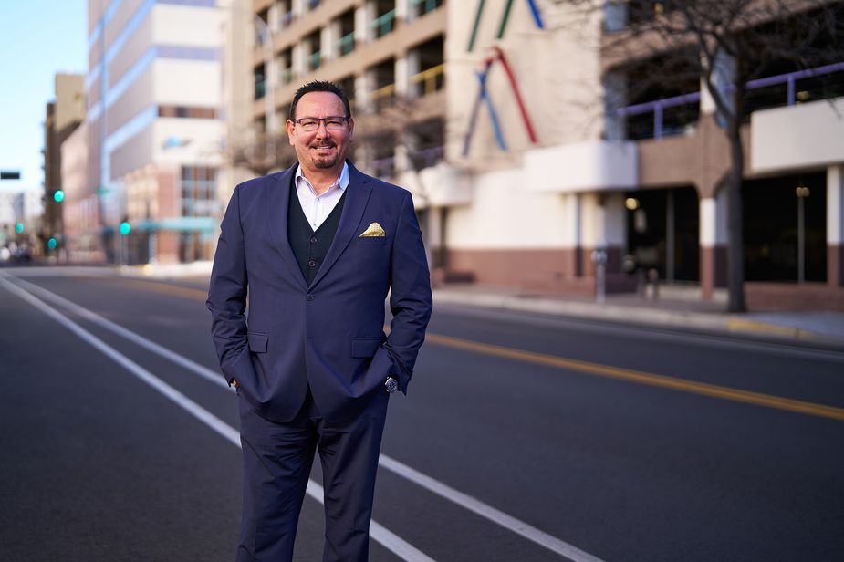 Del Esparza of the Kansas City Fed's Denver Branch Board of Directors standing in the middle of a street.