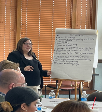 Rachael Surmick with participants at the O'Neill roundtable event in Nebraska