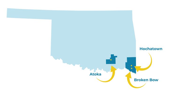 A blue map of Oklahoma with three highlighted areas labeled Atoka, Broken Bow, and Hochatown, each marked by a yellow dot and arrow pointing to their locations.