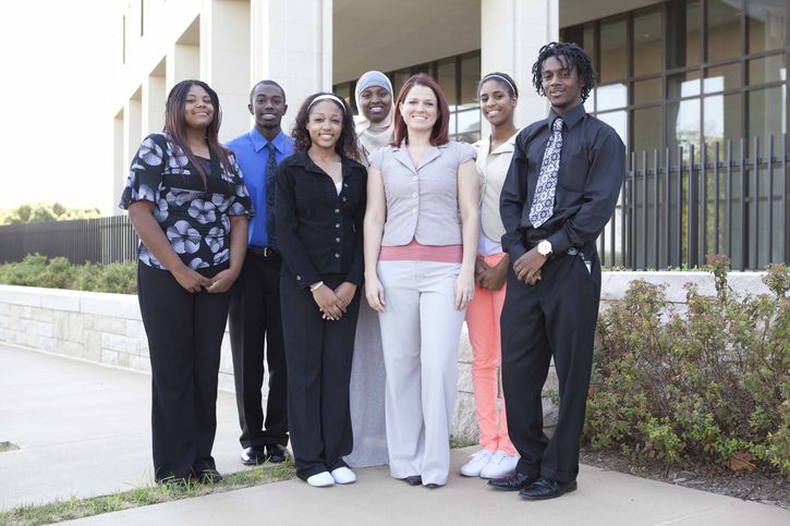 The Kansas City Fed’s Student Board of Directors  wraps up its first year of service with a formal pinning ceremony led by President George.